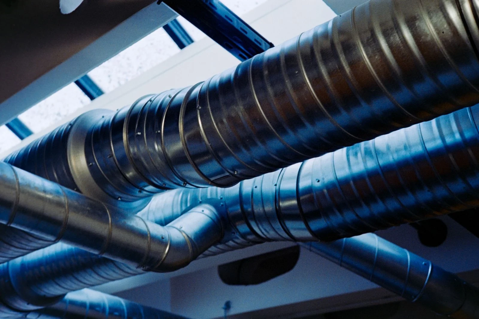 Metal ventilation ducts photographed from below